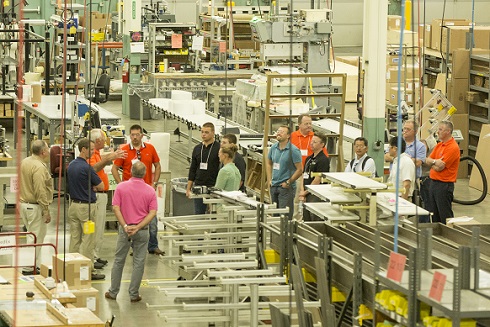 Group of professional on tour of Dorner facilities