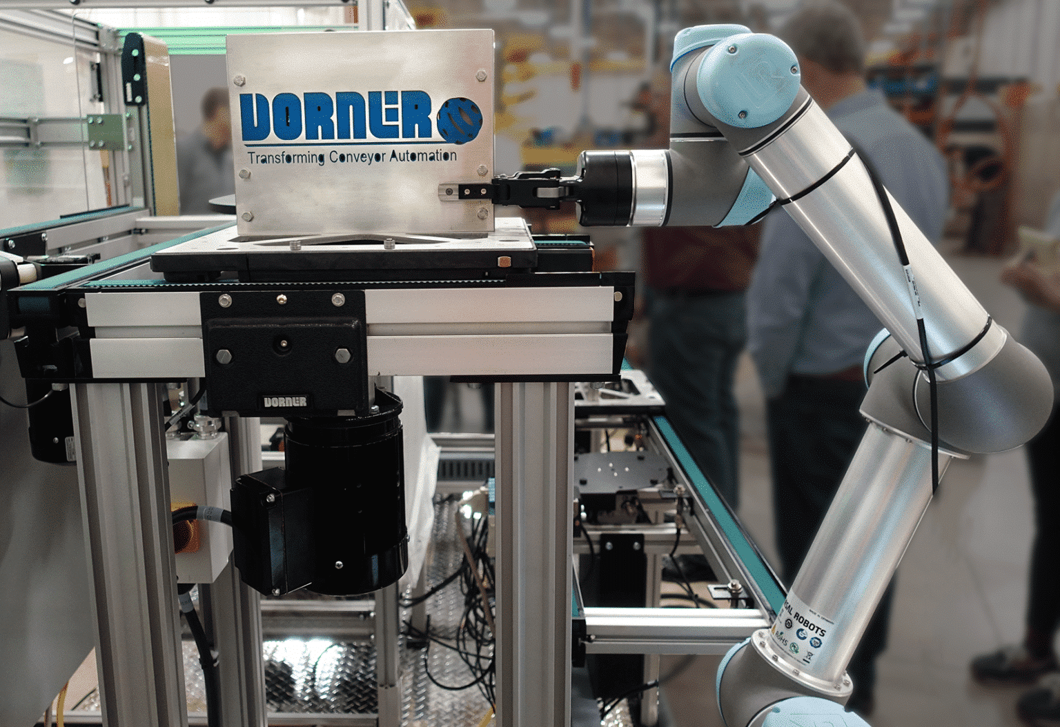 How to Amplify Your Conveyor System with Robotics - Dorner Conveyors