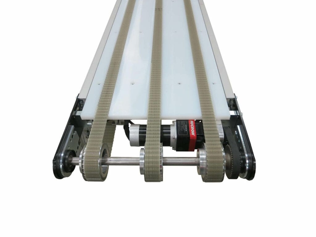 Image of a Dorner 3200 Precision Drive conveyor from the front, where three belts wrap around the conveyor to facilitate precise movement.