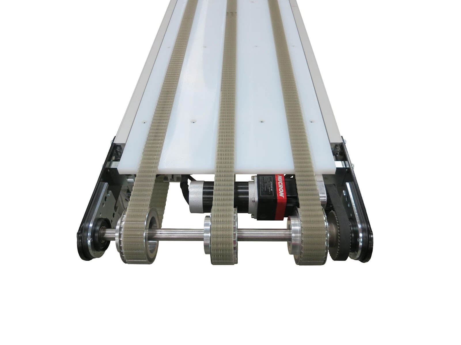 Image of a Dorner 3200 Precision Drive conveyor from the front, where three belts wrap around the conveyor to facilitate precise movement.