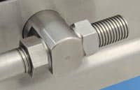 : An up-close image of jack-screw tension device on a Dorner conveyor.