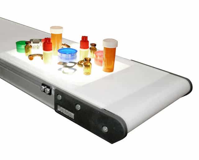 Medical supplies conveyor transporting various medications.