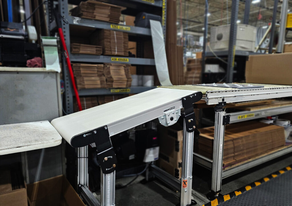 , What Are Safer Alternatives to Manually Moving Totes Between Workstations?