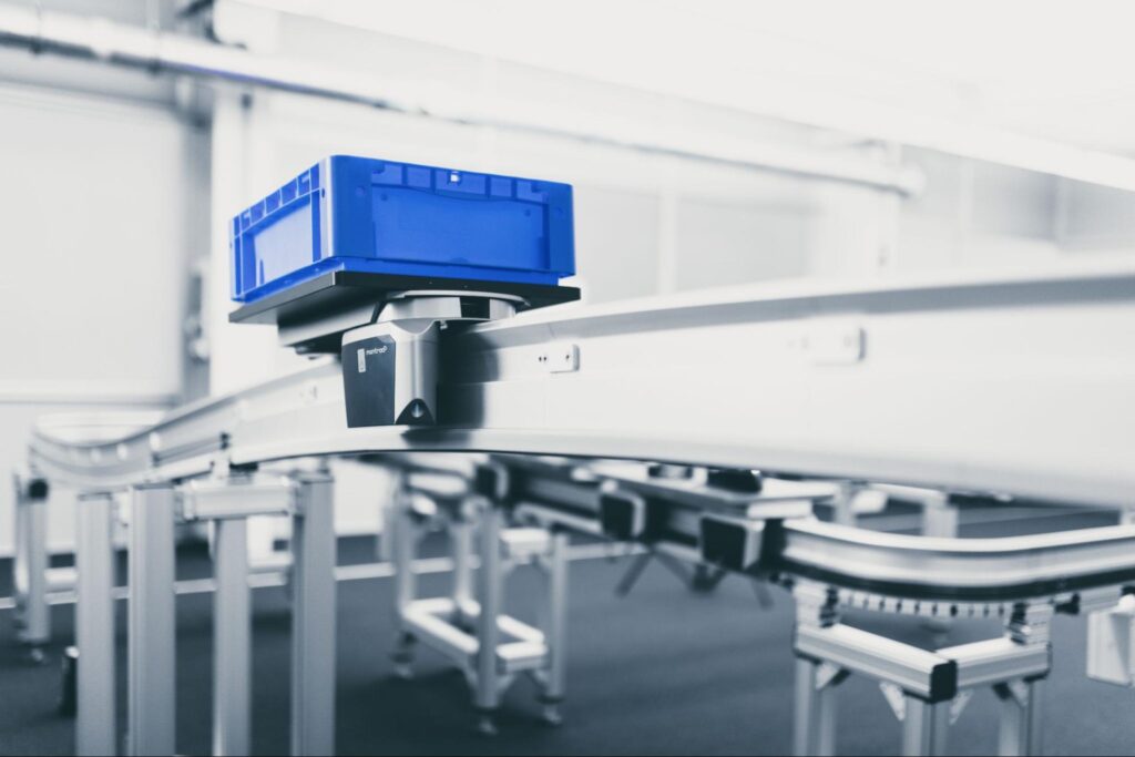 , What Are Safer Alternatives to Manually Moving Totes Between Workstations?